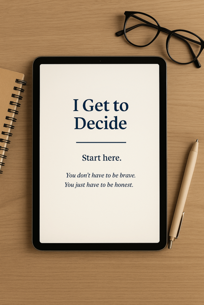 Image of a digital tablet with a guide titled 'I Get to Decide' beside glasses and pen on a wooden table